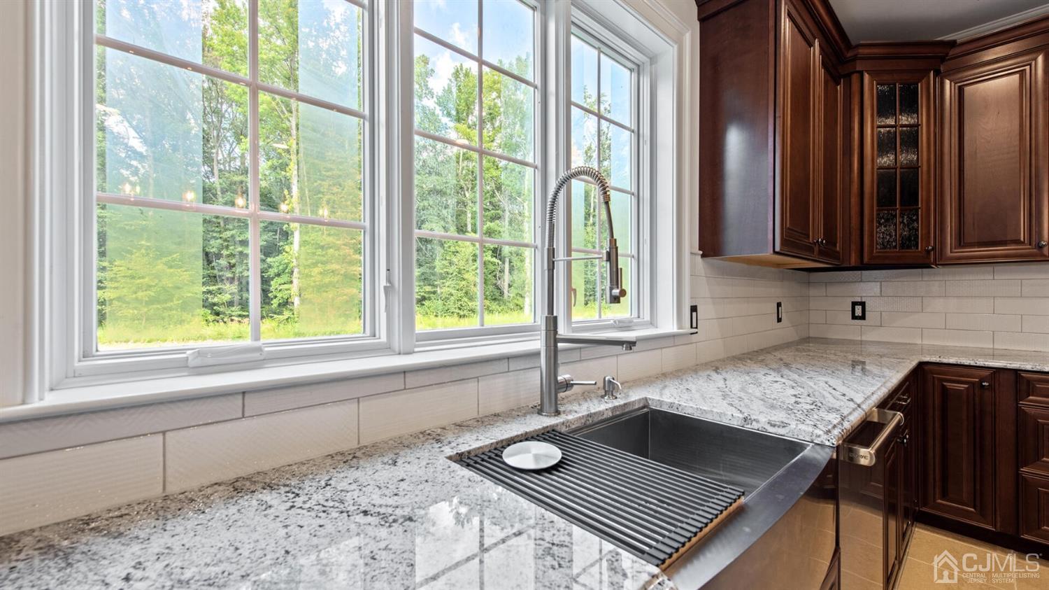 152 Culver Road Monmouth Junction, NJ 08852 - Photo 31 of 87 a bathroom with a granite countertop sink and a large window