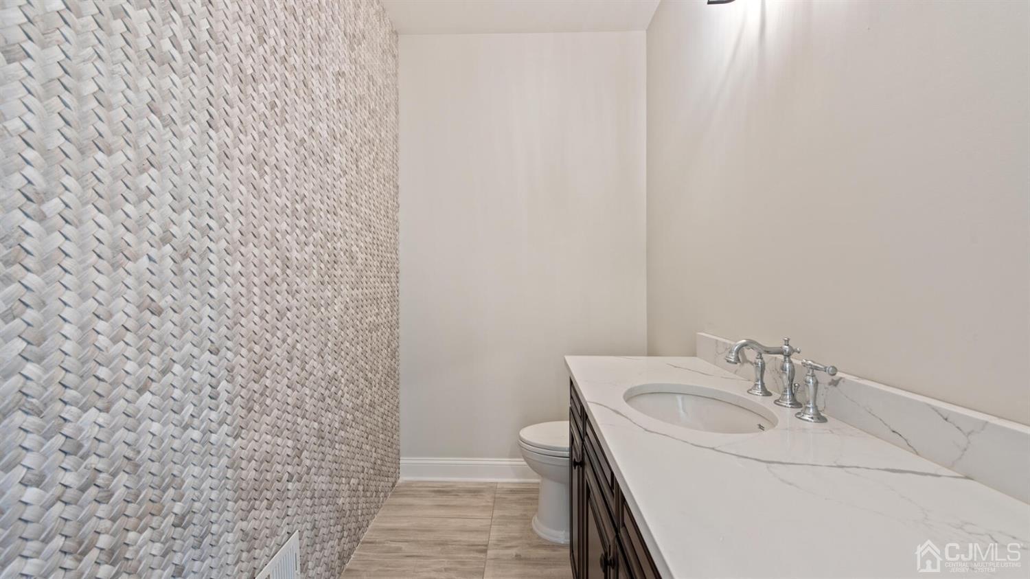 152 Culver Road Monmouth Junction, NJ 08852 - Photo 40 of 87 a bathroom with a sink a toilet and shower