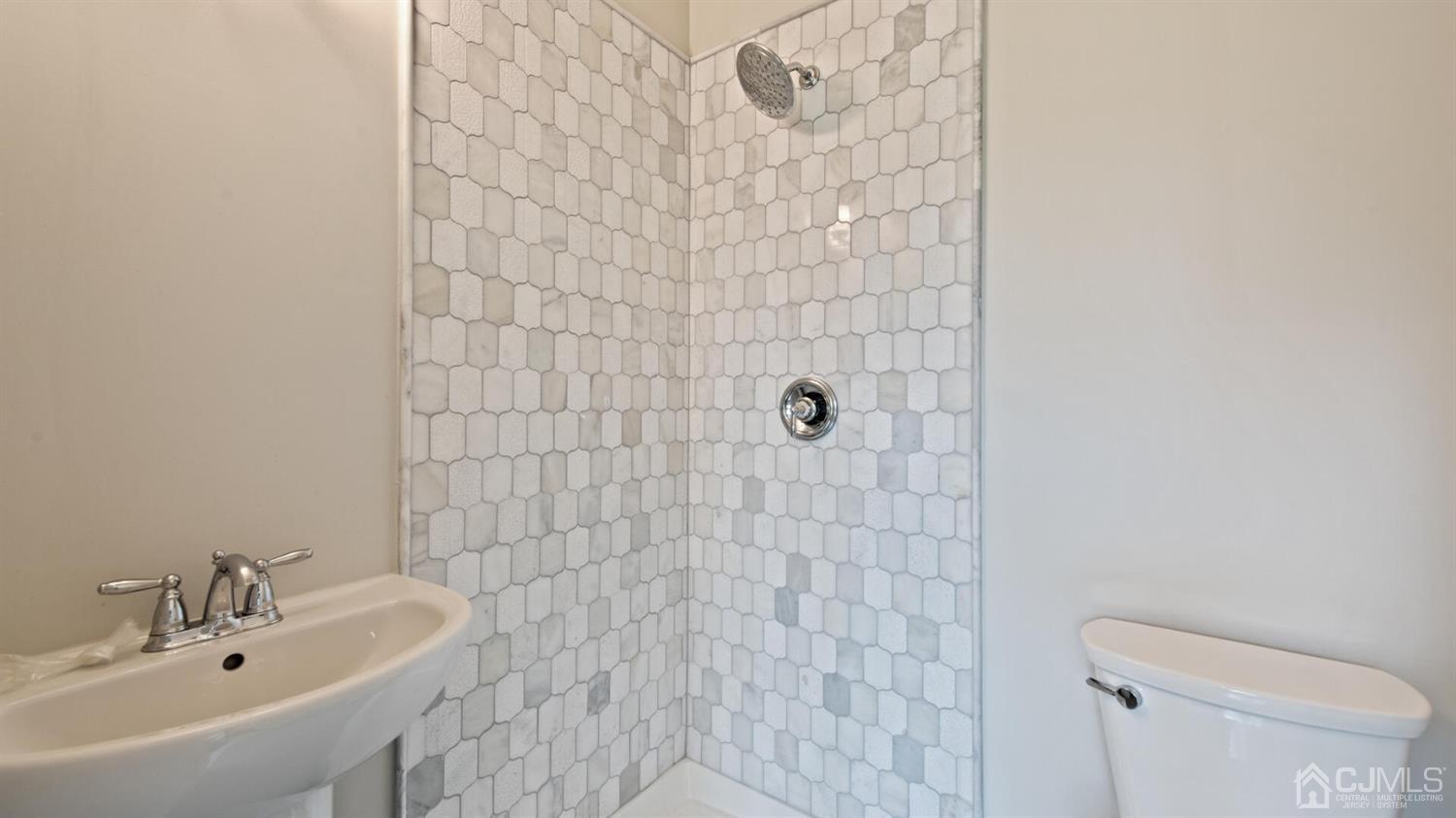 152 Culver Road Monmouth Junction, NJ 08852 - Photo 41 of 87 a bathroom with a sink a toilet and shower