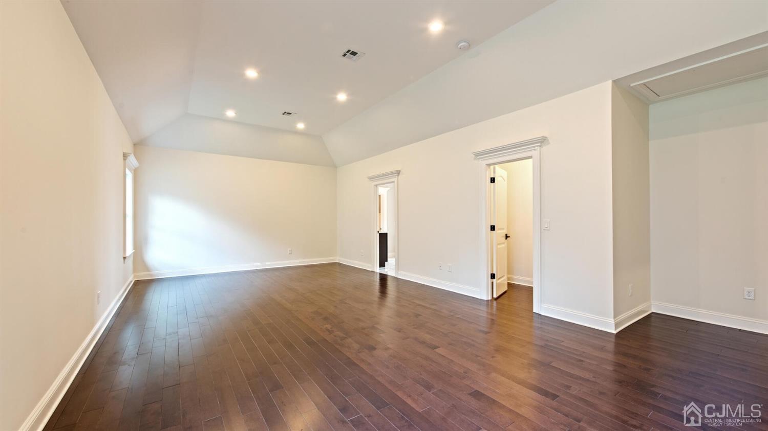 152 Culver Road Monmouth Junction, NJ 08852 - Photo 52 of 87 a view of an empty room with wooden floor