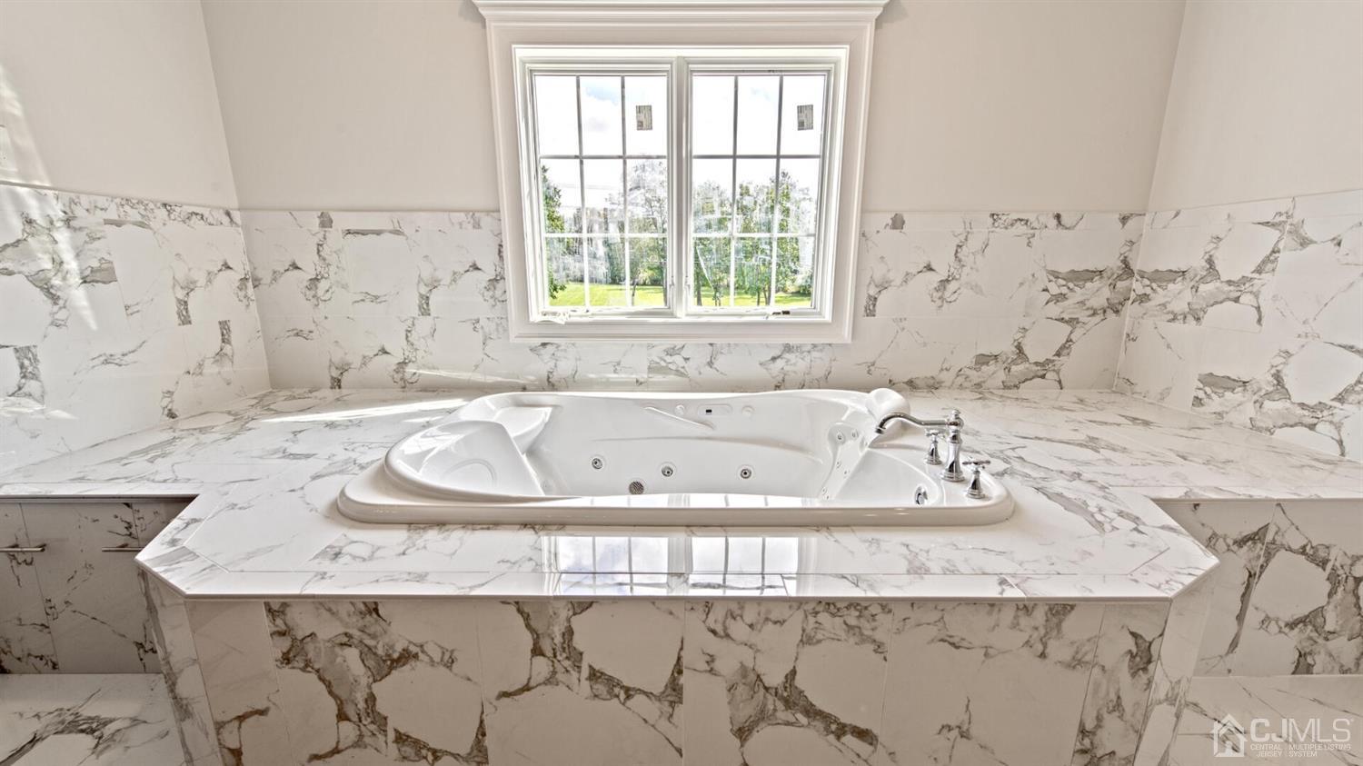 152 Culver Road Monmouth Junction, NJ 08852 - Photo 58 of 87 a bathroom with bathtub sink and window