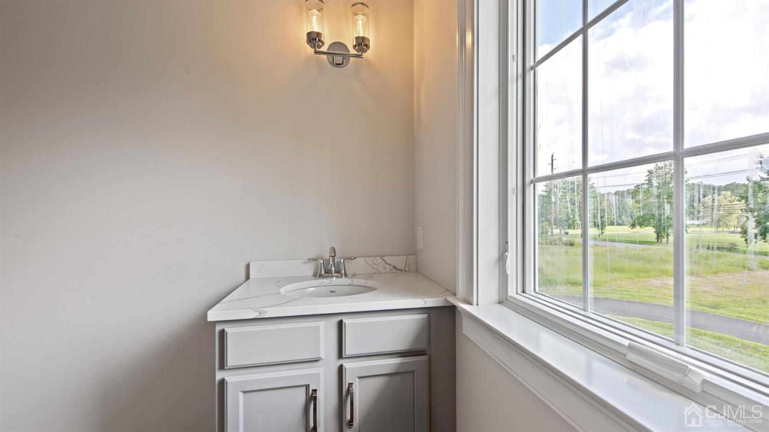 152 Culver Road Monmouth Junction, NJ 08852 - Photo 64 of 87 a bathroom with a sink and a window