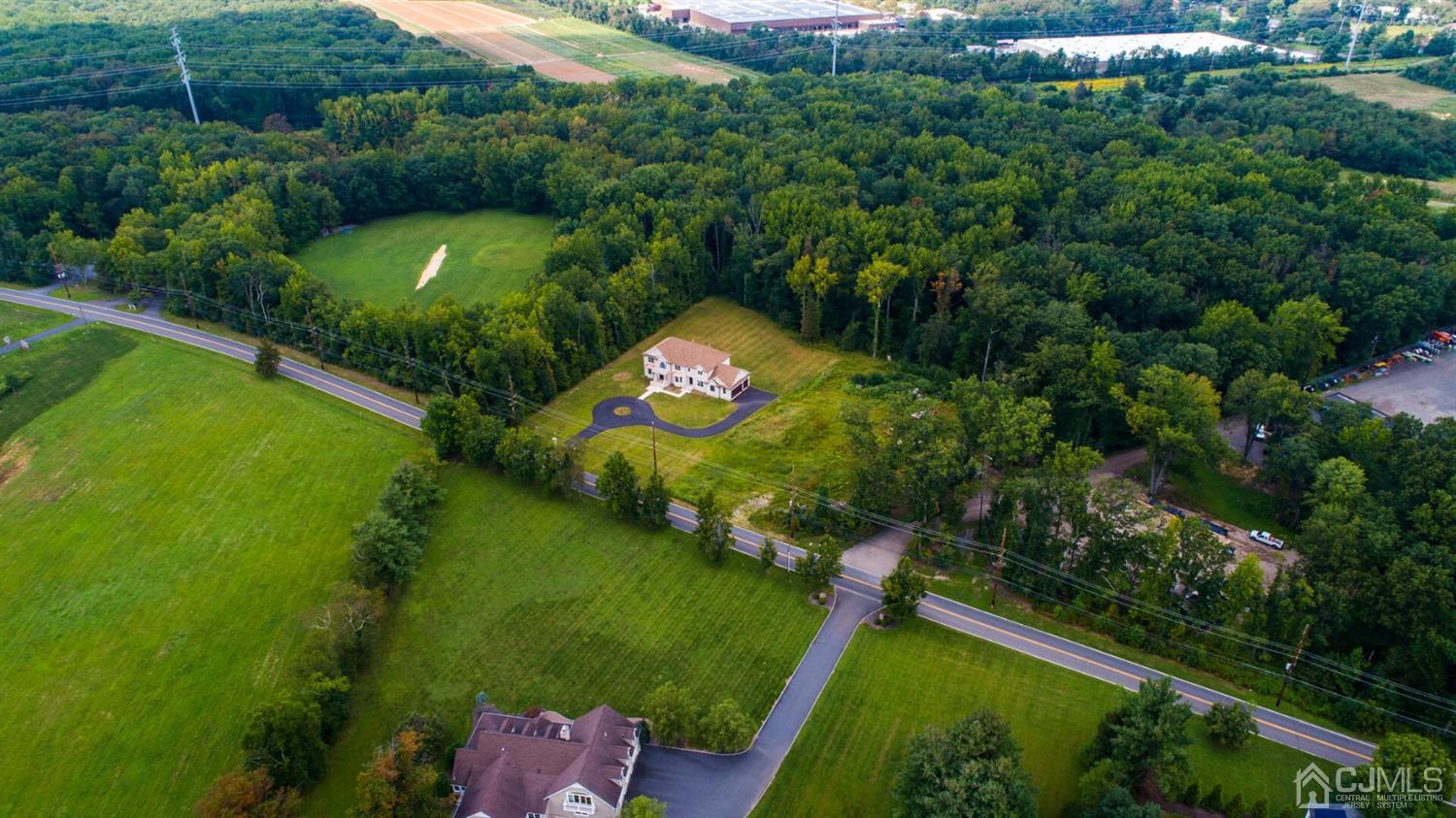 152 Culver Road Monmouth Junction, NJ 08852 - Photo 74 of 87 an aerial view of a house a yard swimming pool outdoor seating and yard