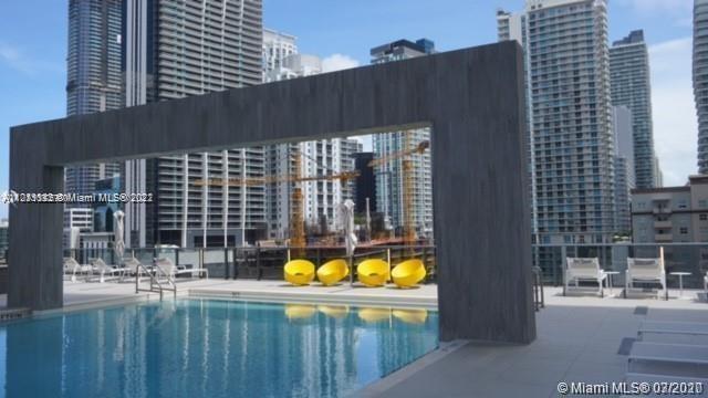 55 Southwest 9th Street, Unit 3307 Miami, FL 33130 - Photo 13 of 16 a view of swimming pool from a balcony