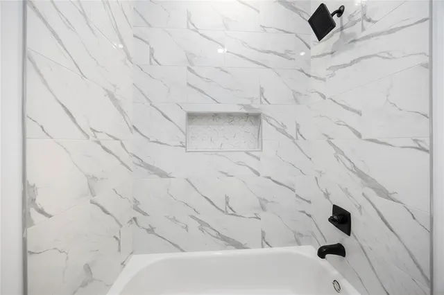 a bathroom with a bathtub