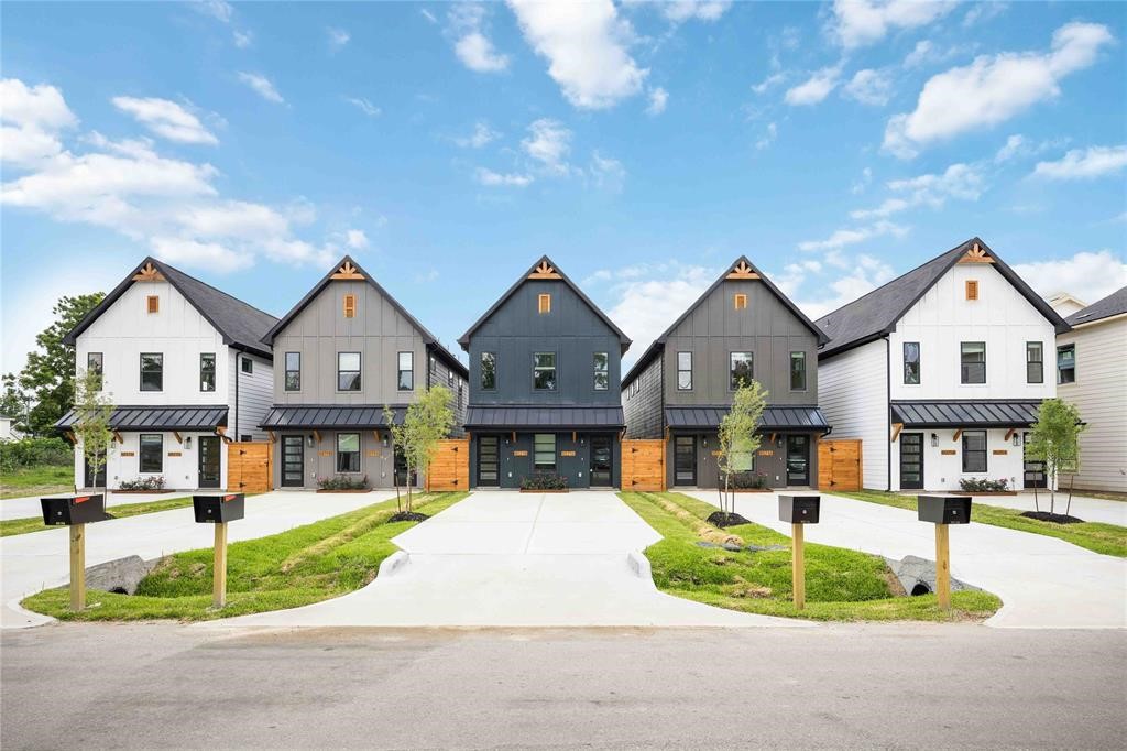 8019 Cora Street, Unit A Houston, TX 77088 - Photo 2 of 25 a front view of a house with a yard
