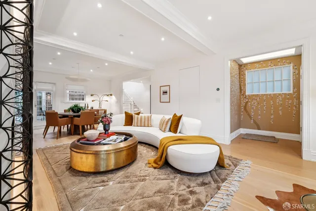 a kitchen with sink cabinets and dining table