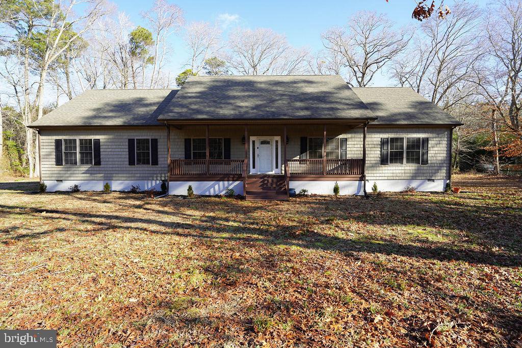 30980 Rehobeth Road Westover, MD 21871 - Photo 1 of 36 a front view of a house with swimming pool