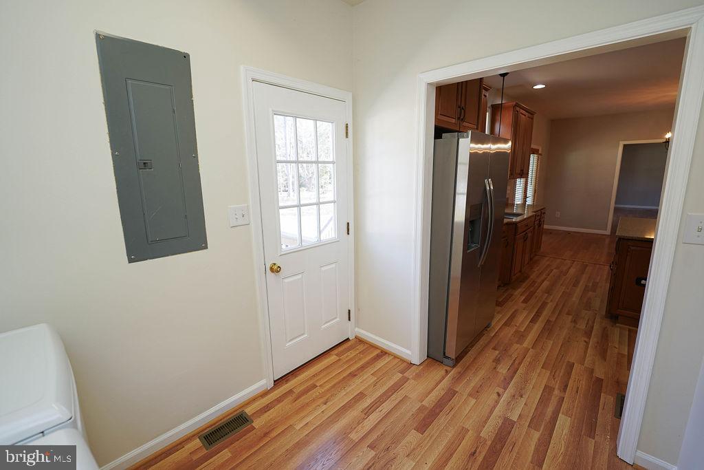 30980 Rehobeth Road Westover, MD 21871 - Photo 13 of 36 a view of hallway with wooden floor