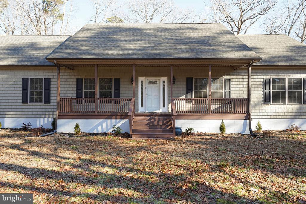 30980 Rehobeth Road Westover, MD 21871 - Photo 2 of 36 a front view of a house with a yard