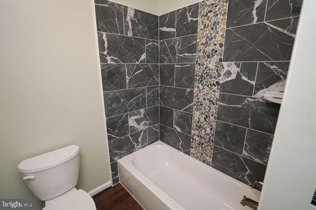 30980 Rehobeth Road Westover, MD 21871 - Photo 22 of 36 a bathroom with a toilet and shower