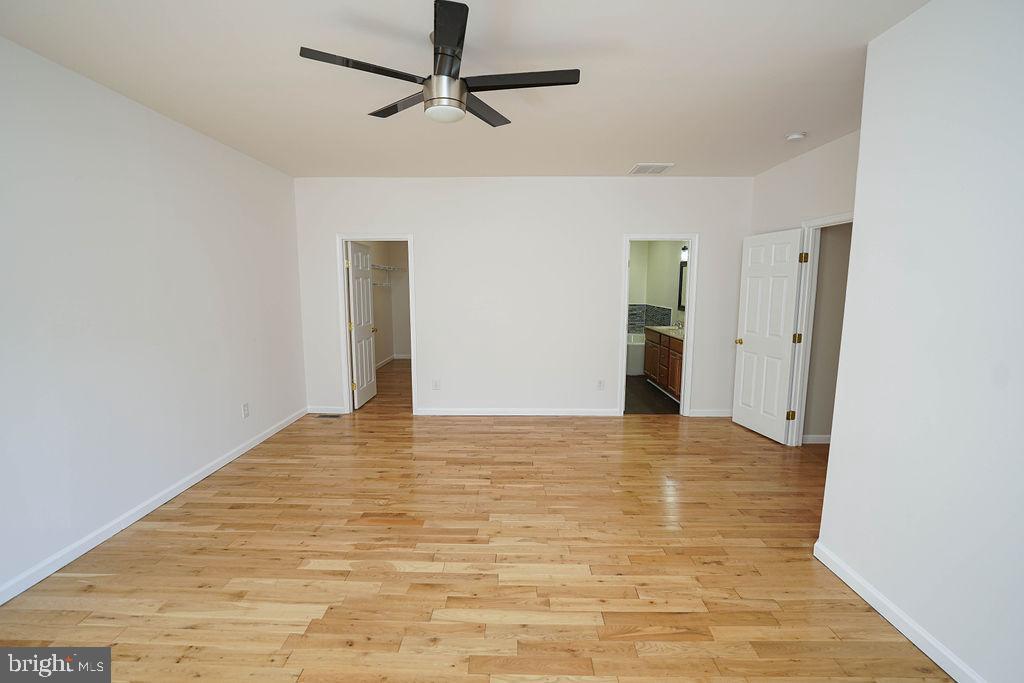 30980 Rehobeth Road Westover, MD 21871 - Photo 25 of 36 a view of an empty room with wooden floor