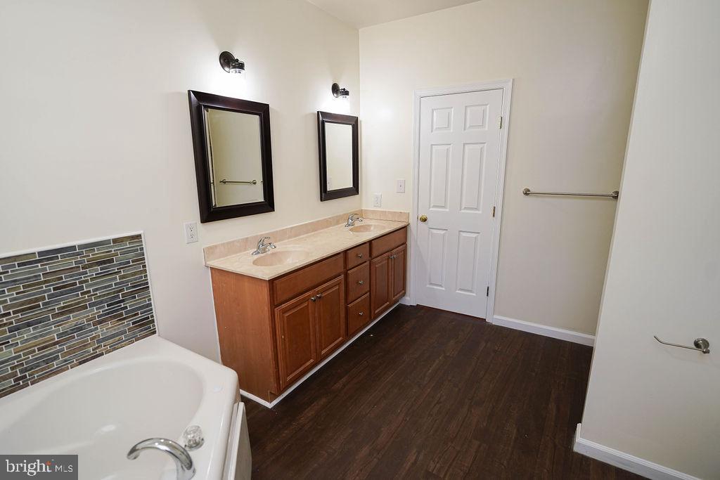 30980 Rehobeth Road Westover, MD 21871 - Photo 28 of 36 a bathroom with a sink and a mirror