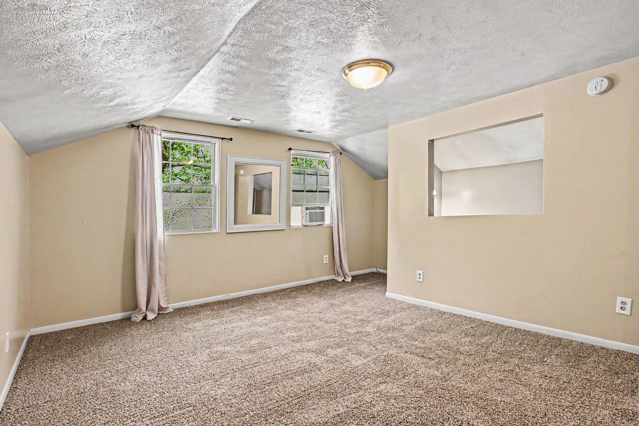 115 McClung Road La Porte, IN 46350 - Photo 9 of 31 an empty room with windows