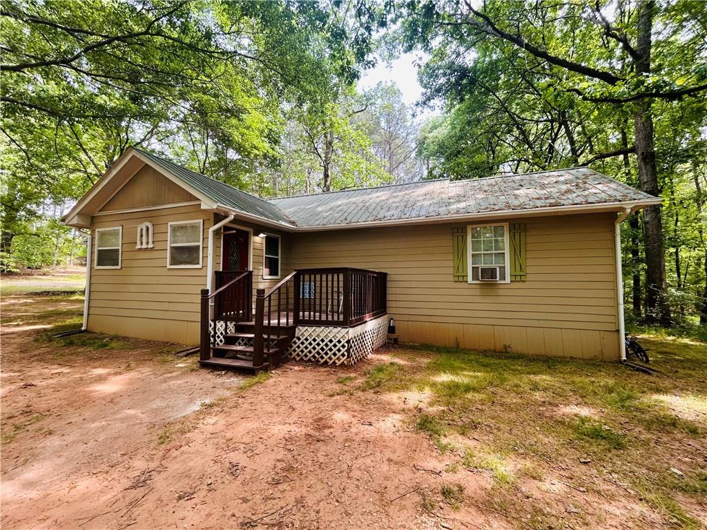 27 Hawks Trail Newborn, GA 30056 - Photo 1 of 33 a view of a house with a yard
