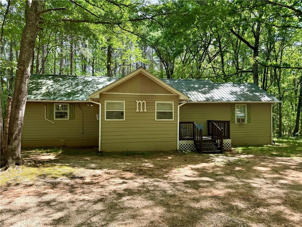 27 Hawks Trail Newborn, GA 30056 - Photo 2 of 33 a front view of a house with yard