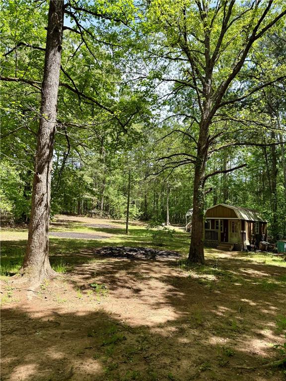 27 Hawks Trail Newborn, GA 30056 - Photo 24 of 33 a view of a house with a yard