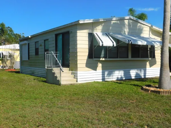a front view of house with yard