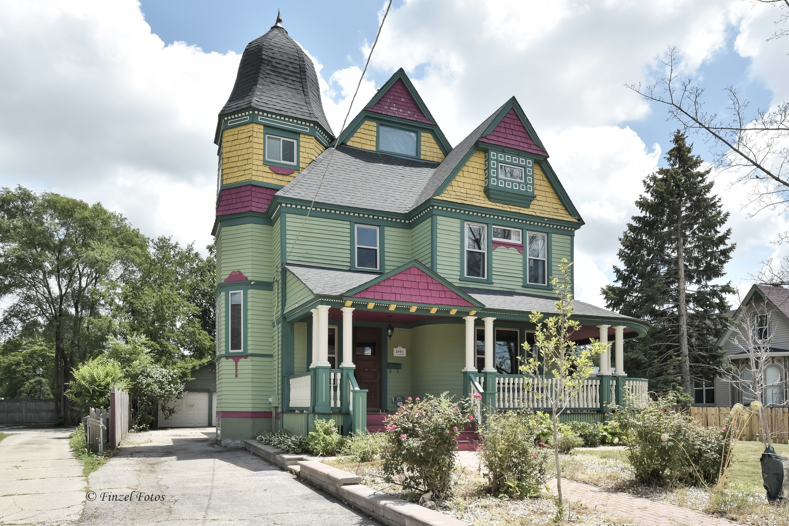 331 Griswold Street Elgin, IL 60123 - Photo 1 of 36 a front view of a house with garden