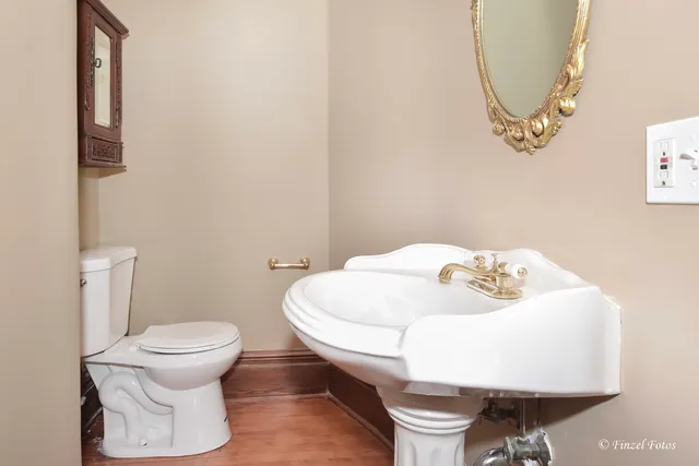 a bathroom with a sink and a toilet