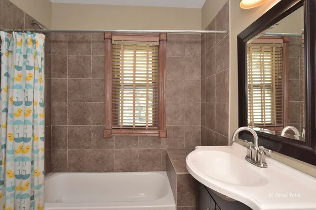 a bathroom with a sink and a bathtub