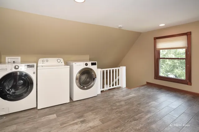 a view of a storage & utility room with washer and dryer