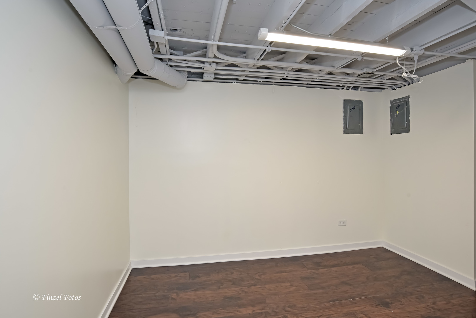 331 Griswold Street Elgin, IL 60123 - Photo 27 of 36 a view of a room with wooden floor