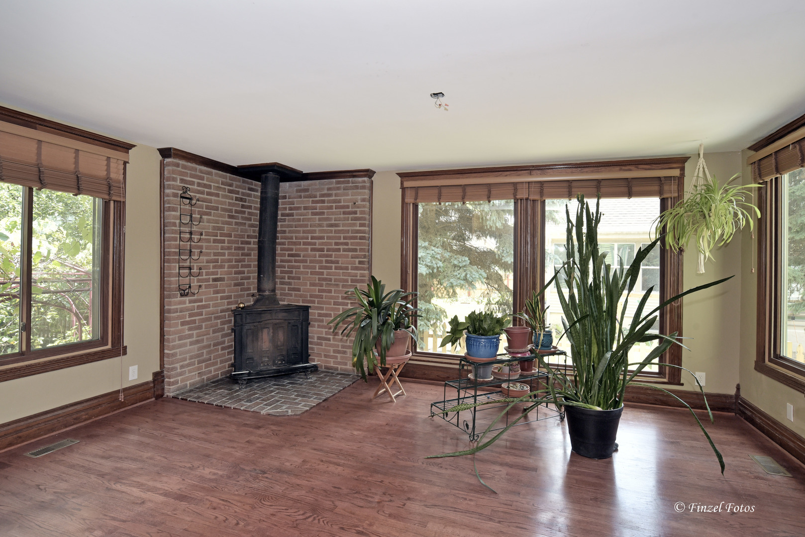 331 Griswold Street Elgin, IL 60123 - Photo 7 of 36 a living room with furniture and floor to ceiling windows