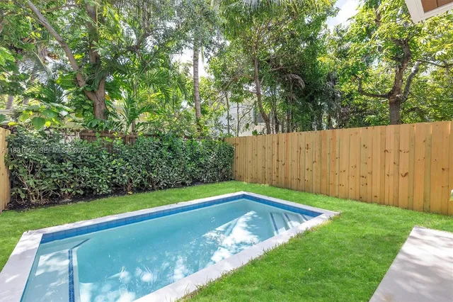 a view of a hallway with closet area