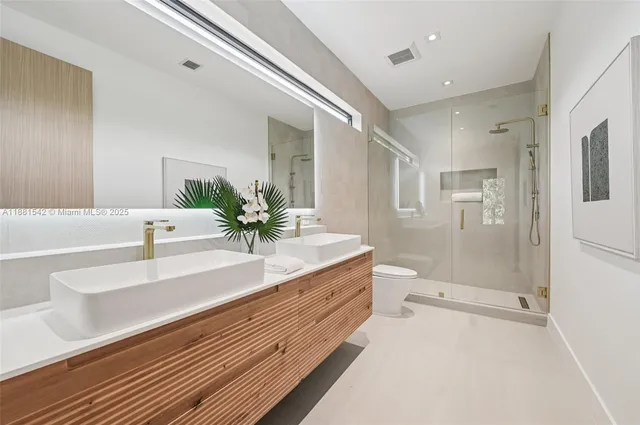 a bathroom with a bathtub and a sink