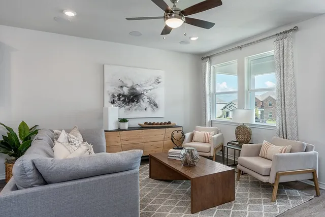 a bed room with a bed and a potted plant