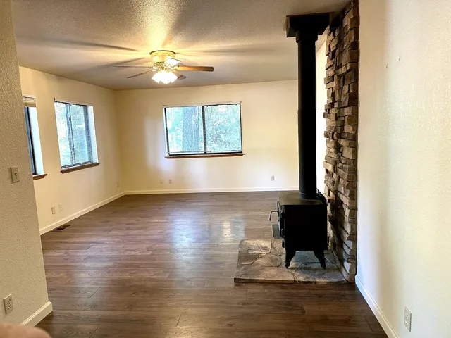 a view of an entryway with wooden floor