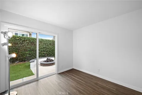 a view of room with window and floor to ceiling window