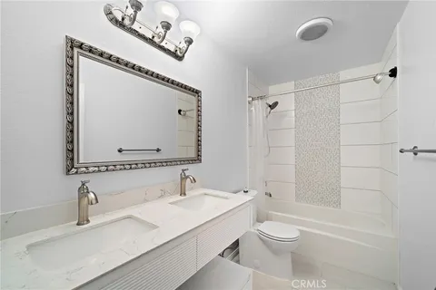 a view of a patio with a fountain