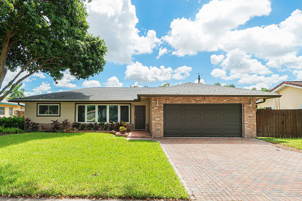 24 Burning Tree Lane Boca Raton, FL 33431 - Photo 1 of 10 001-24BurningTreeLn-BocaRaton-FL-small