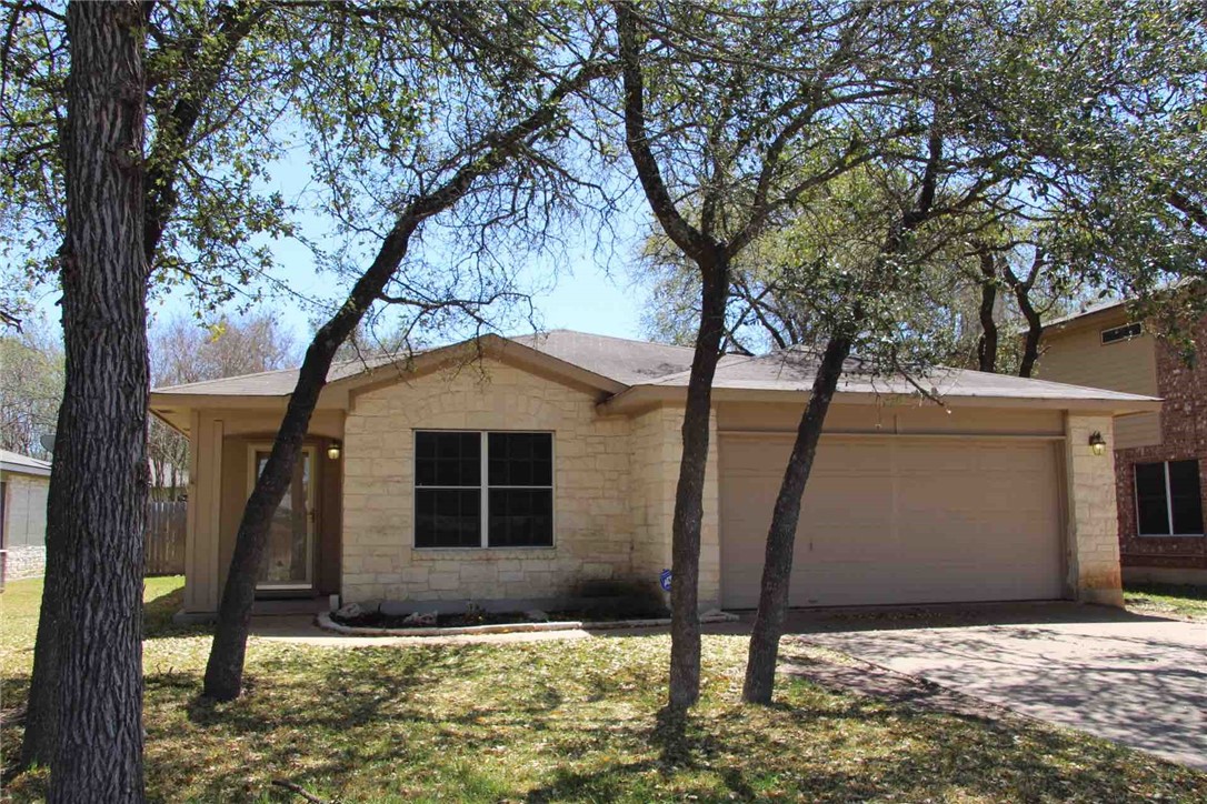 1902 Killians Way Cedar Park, TX 78613 - Photo 1 of 1 a front view of a house with garden