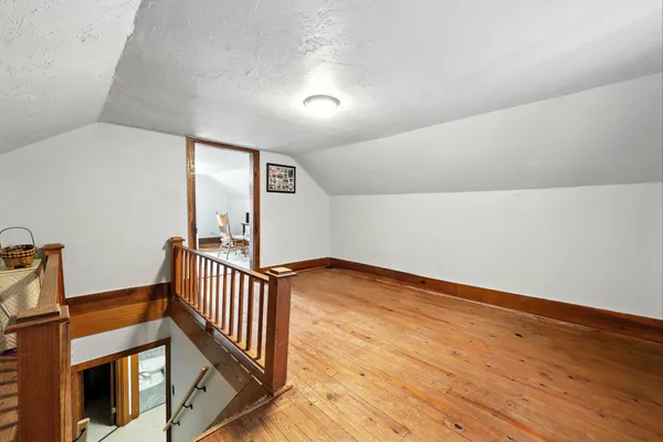 a view of a room with a window and closet