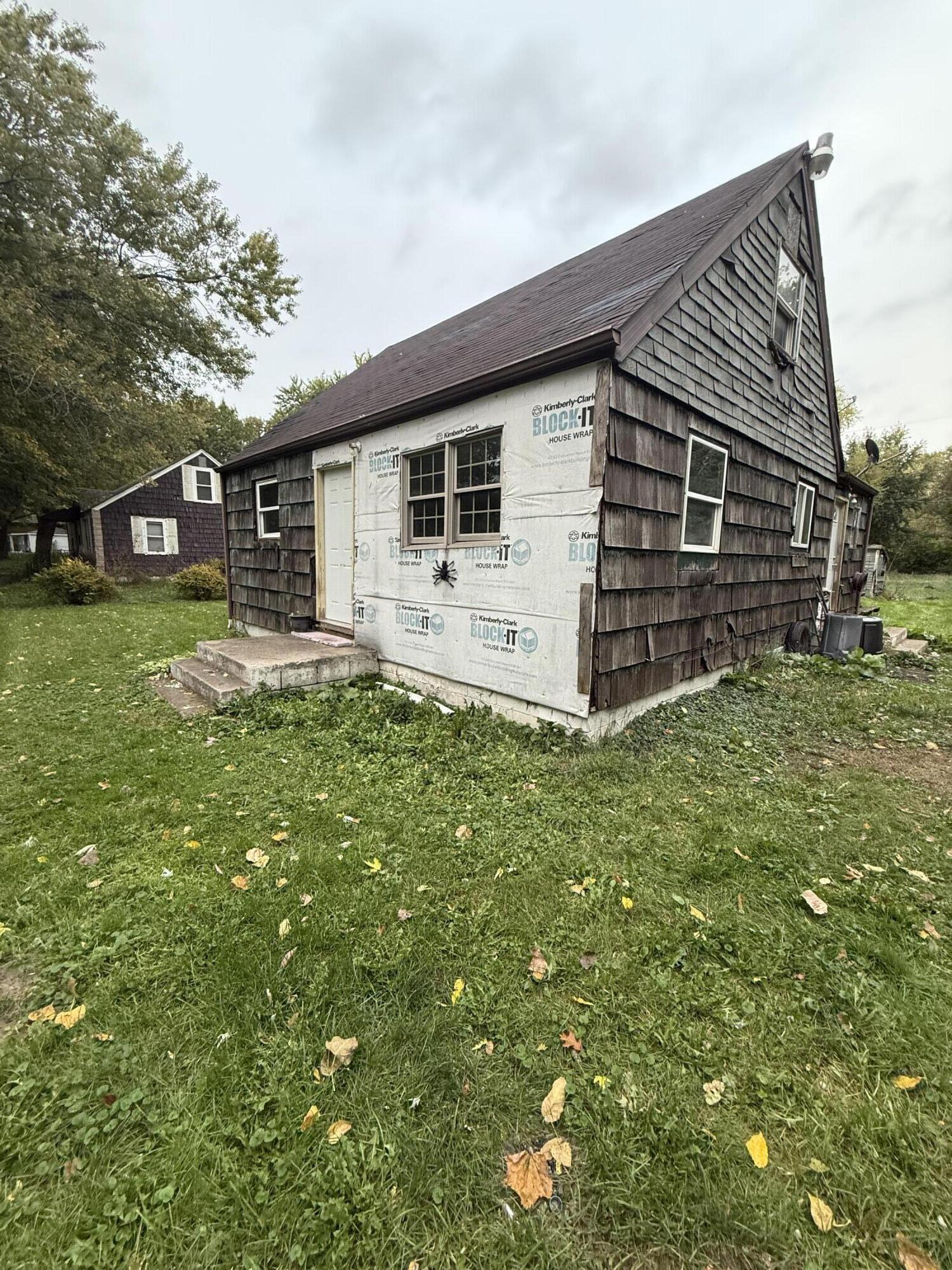 2415 Hanley Street Gary, IN 46406 - Photo 2 of 16 a view of a house with a yard