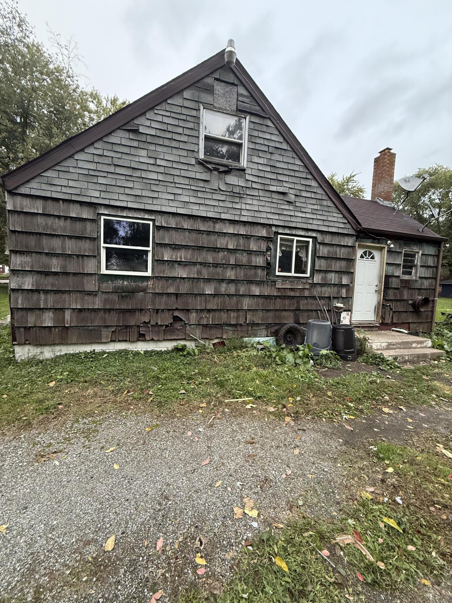 2415 Hanley Street Gary, IN 46406 - Photo 3 of 16 a view of front of a house with a yard