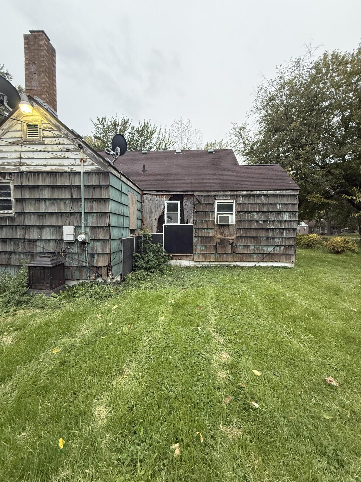 2415 Hanley Street Gary, IN 46406 - Photo 4 of 16 a view of a house with a backyard