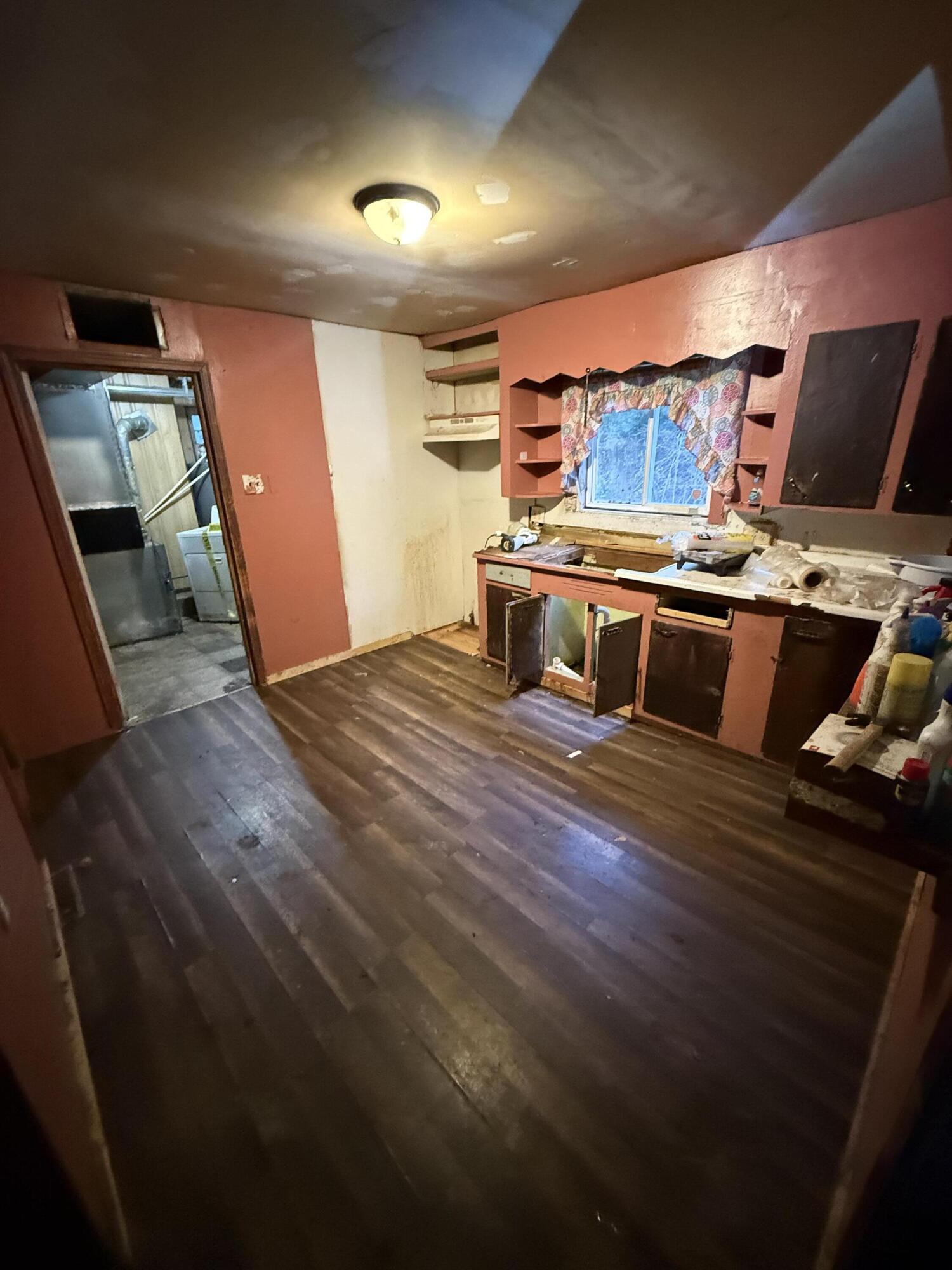2415 Hanley Street Gary, IN 46406 - Photo 5 of 16 a view of a room with wooden floor