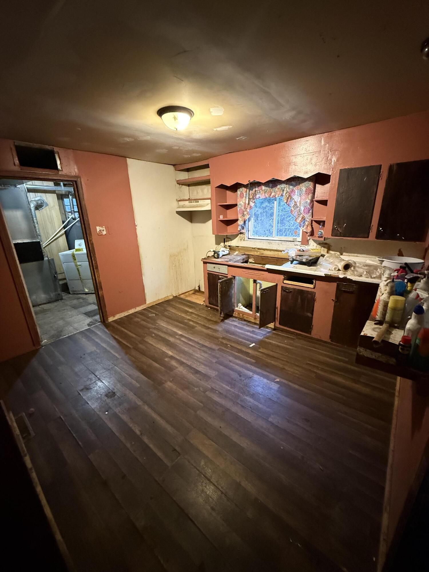 2415 Hanley Street Gary, IN 46406 - Photo 7 of 16 a kitchen with a stove and a refrigerator