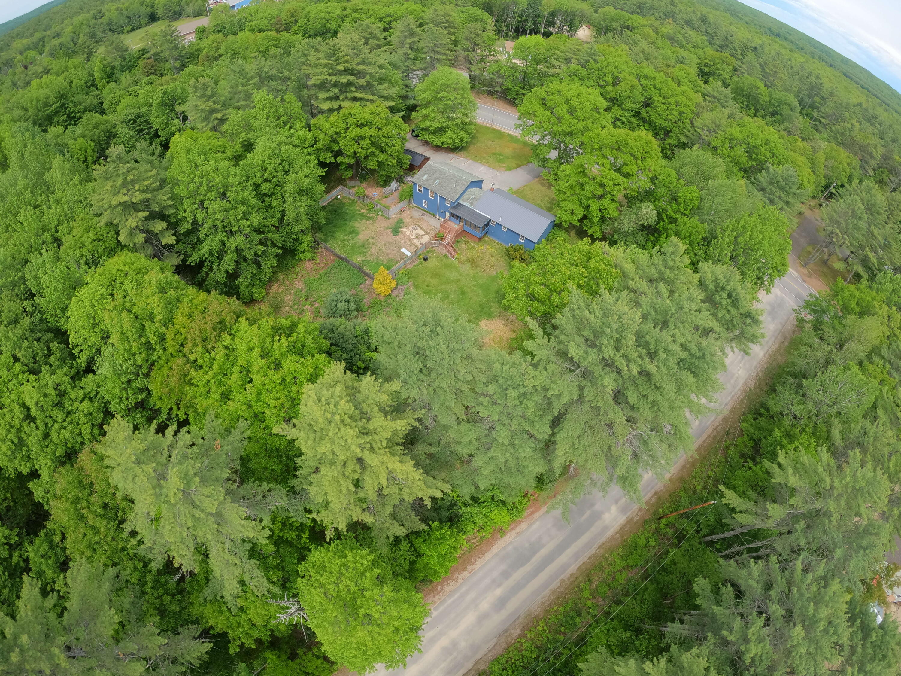 216 Sabbathday Road New Gloucester, ME 04260 - Photo 9 of 13 Hillside rd on the side of property