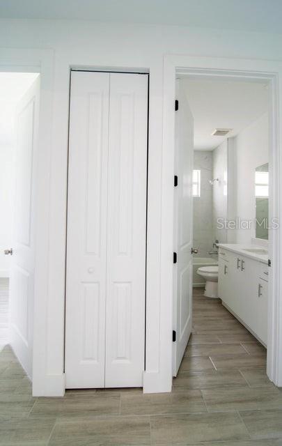 10654 Washington Road Port Charlotte, FL 33981 - Photo 12 of 35 a view of a kitchen with white cabinets