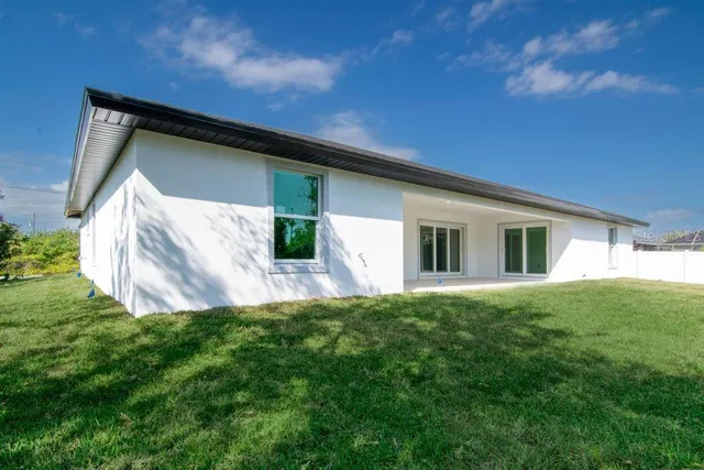 a view of backyard of house