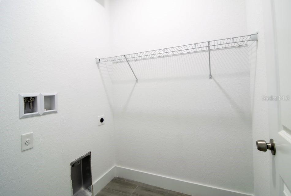 10654 Washington Road Port Charlotte, FL 33981 - Photo 25 of 35 a view of small space with racks on the wall