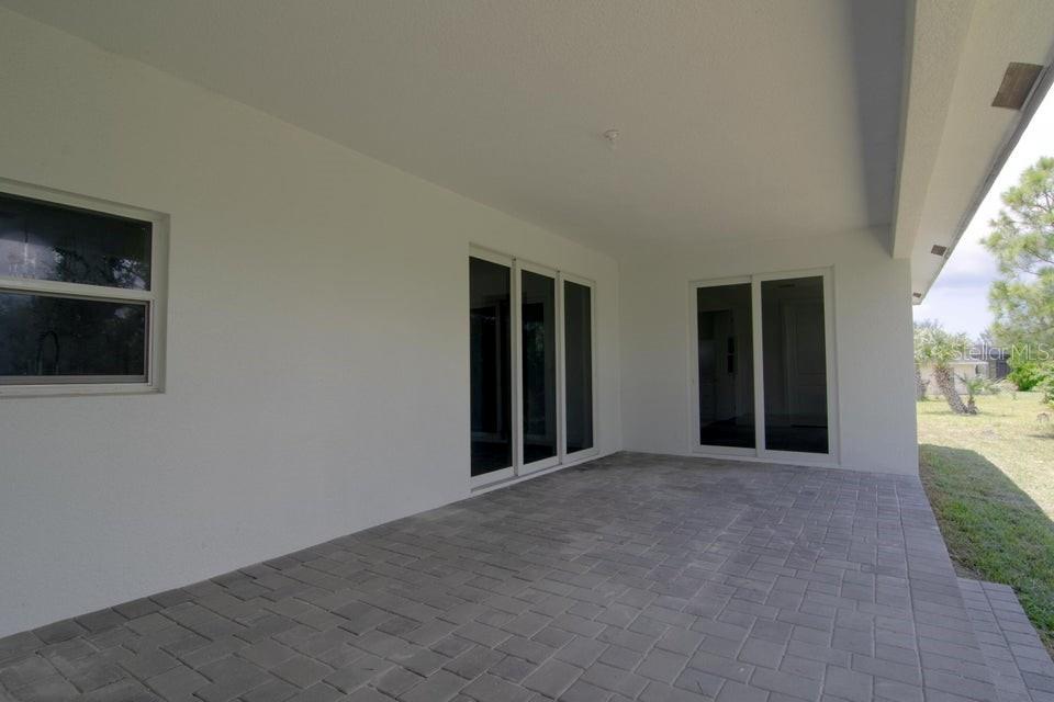 10654 Washington Road Port Charlotte, FL 33981 - Photo 26 of 35 a view of an empty room with a window
