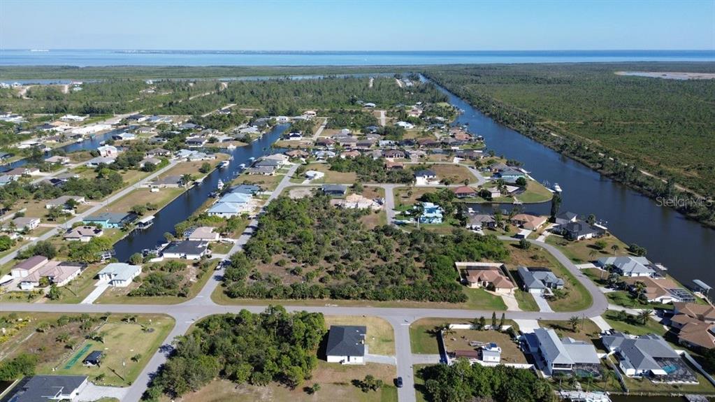 10654 Washington Road Port Charlotte, FL 33981 - Photo 33 of 35 an aerial view of residential building with outdoor space