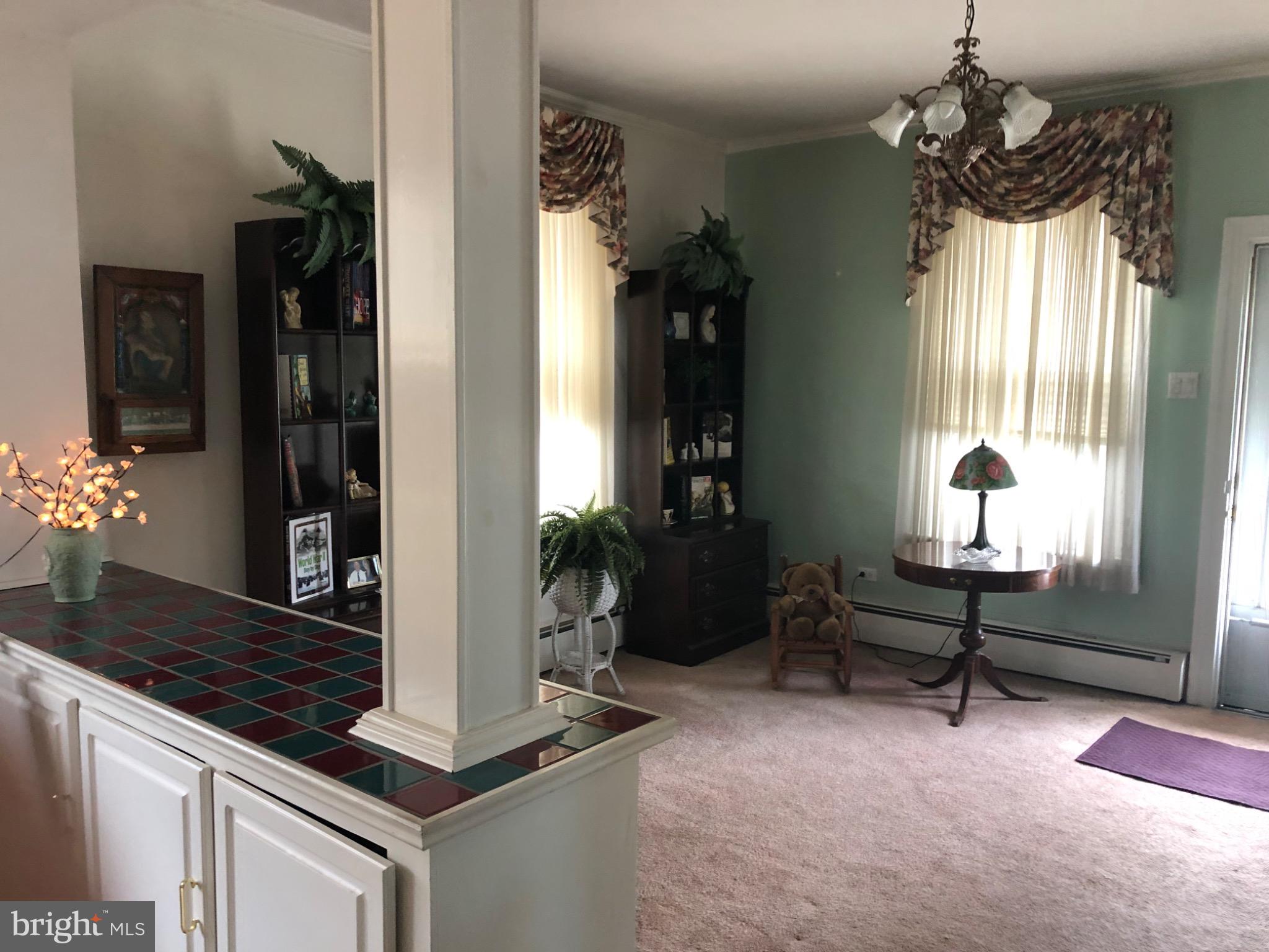 320 Cameron Street Marysville, PA 17053 - Photo 13 of 15 a dining room with chandelier windows and furniture