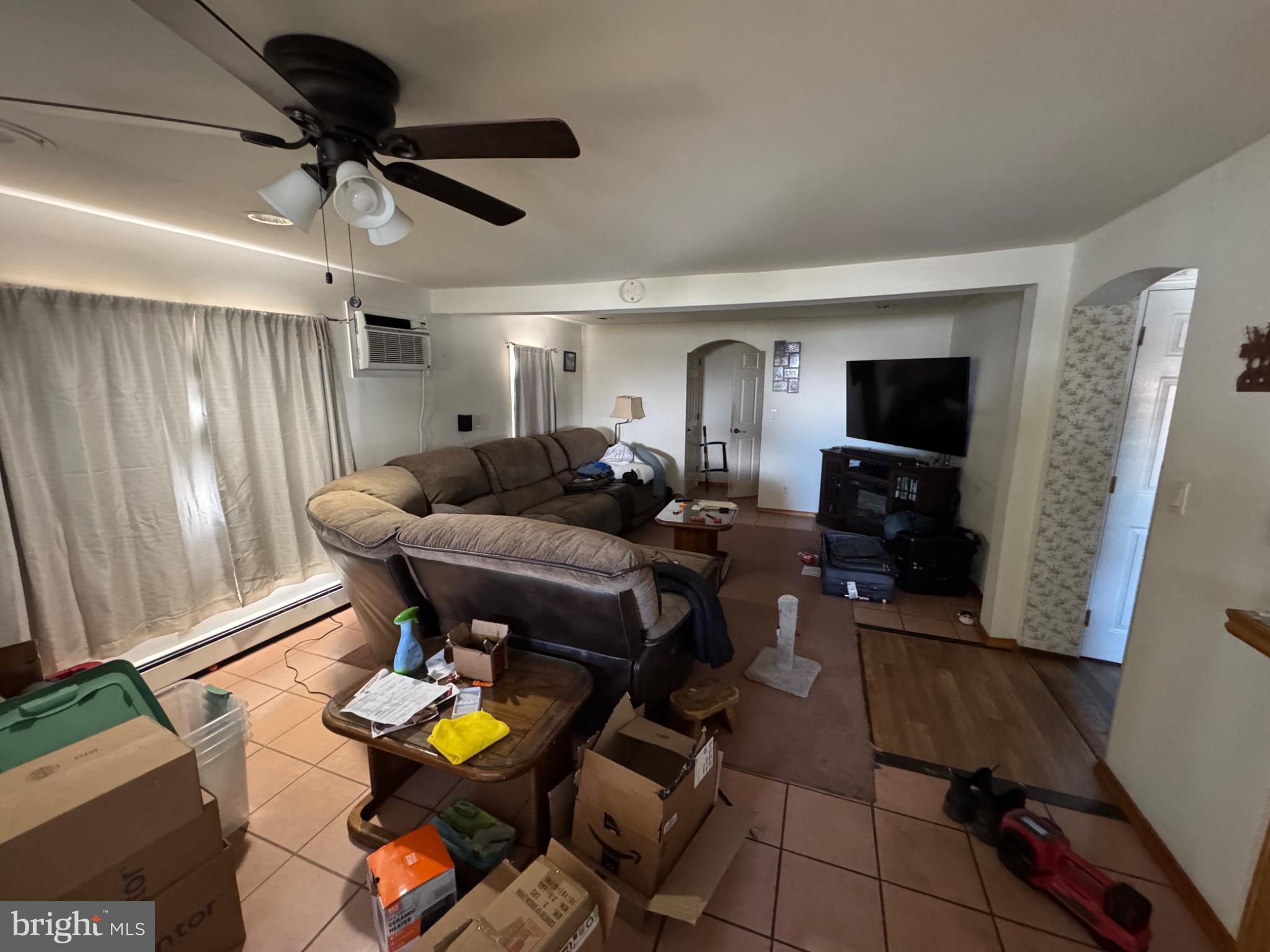 320 Cameron Street Marysville, PA 17053 - Photo 4 of 15 a living room with furniture and a flat screen tv